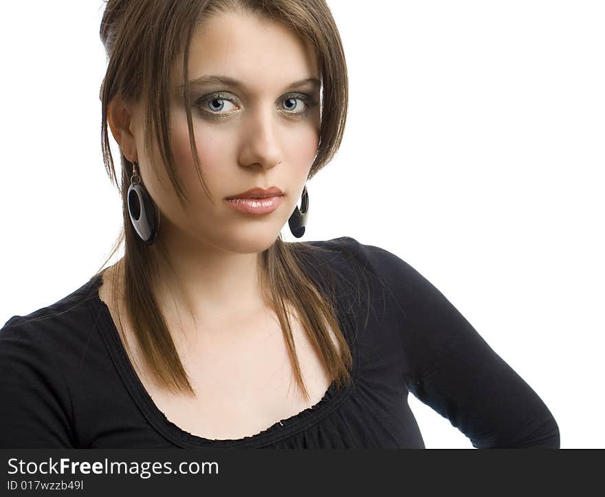 Portrait of an attractive girl with black earrings on white background. Portrait of an attractive girl with black earrings on white background