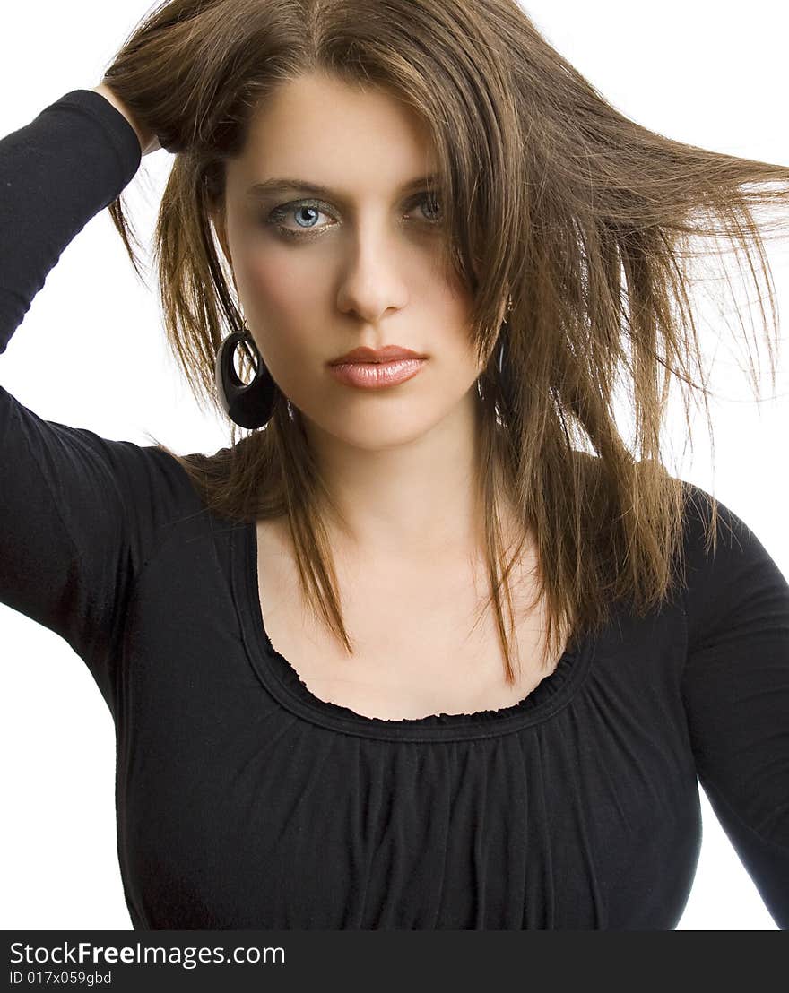 Portrait of an attractive girl with black earrings on white background. Portrait of an attractive girl with black earrings on white background