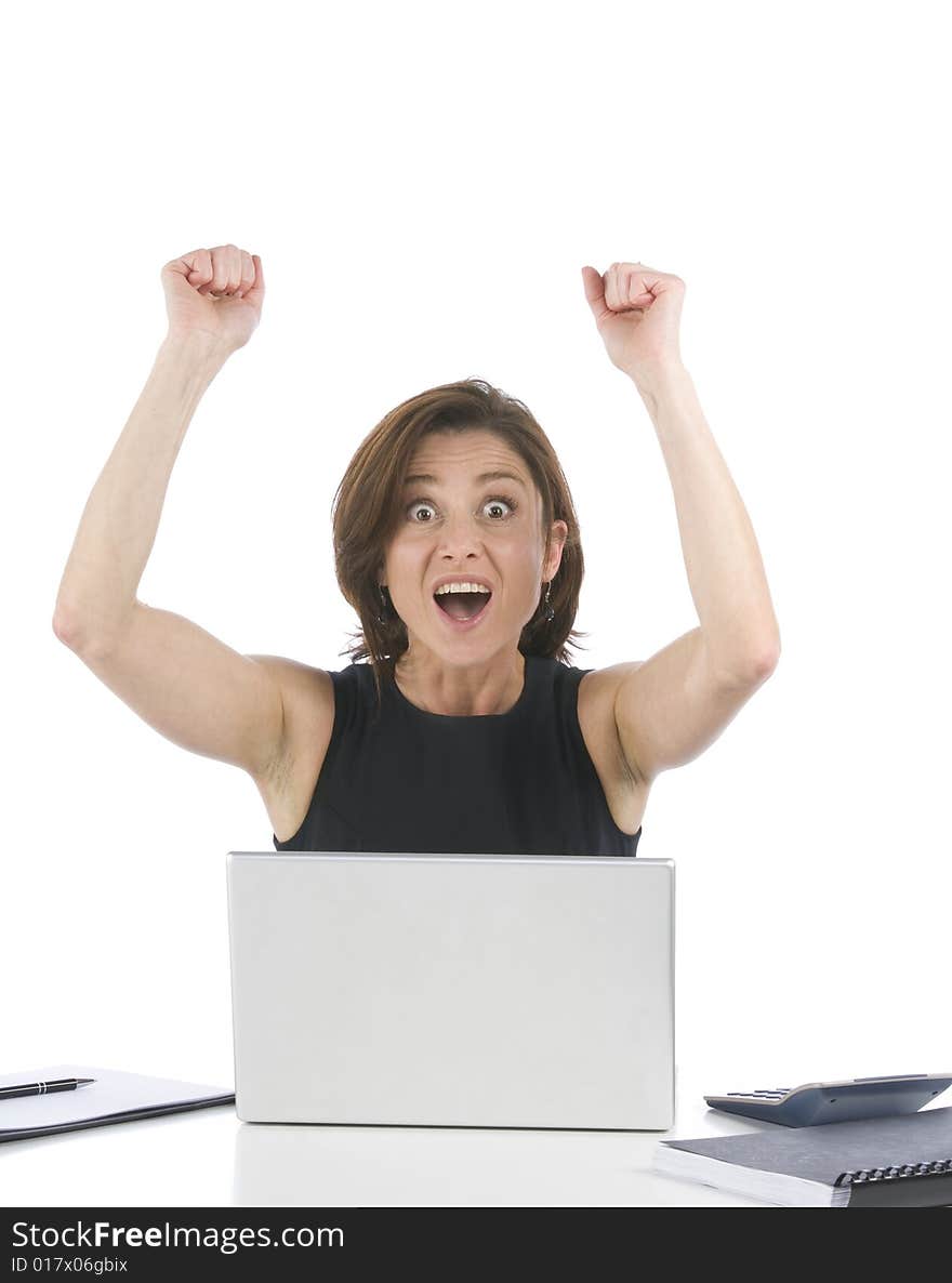 Beautiful businesswoman in her office exulting on a white background