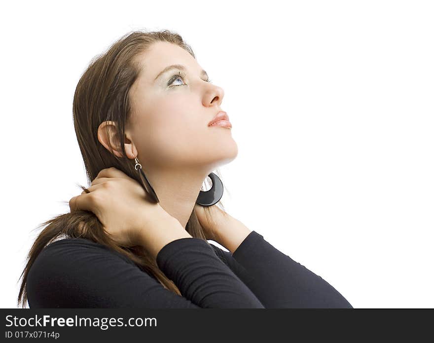 Portrait of an attractive girl with black earrings on white background. Portrait of an attractive girl with black earrings on white background