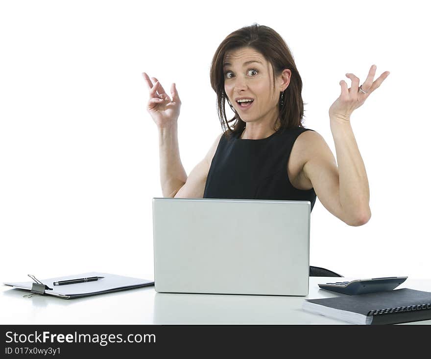 Beautiful businesswoman in her office surprised on a white background