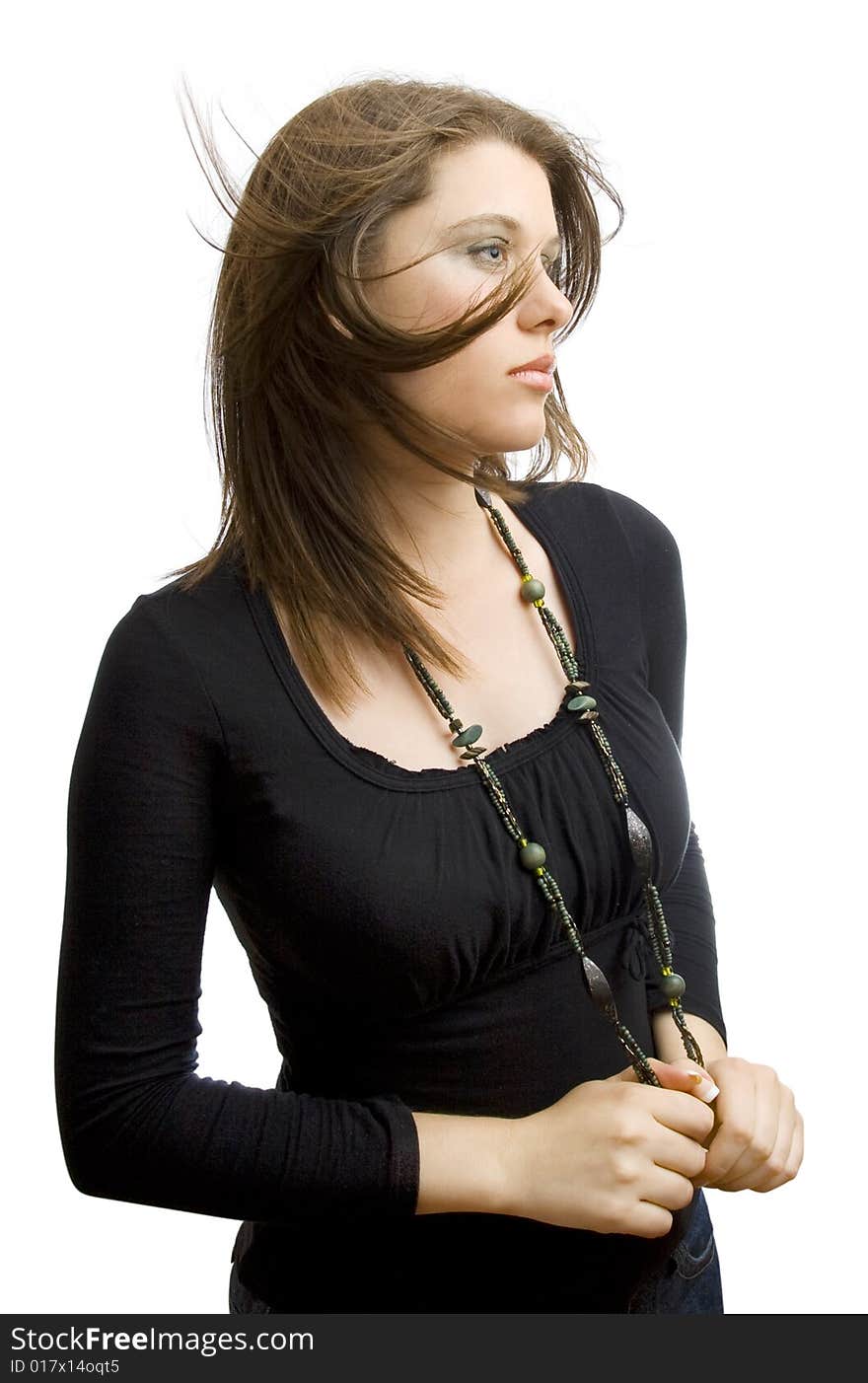 Portrait of an attractive  girl in black on white background. Portrait of an attractive  girl in black on white background