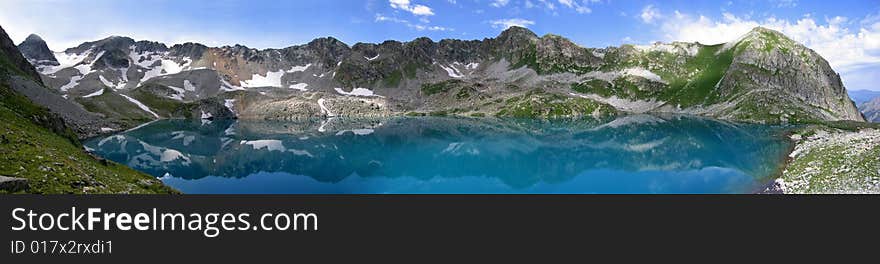 Blue Lake - one of two lakes in the Murundzhu valley, North Caucasus Mountains, Russia. Blue Lake - one of two lakes in the Murundzhu valley, North Caucasus Mountains, Russia