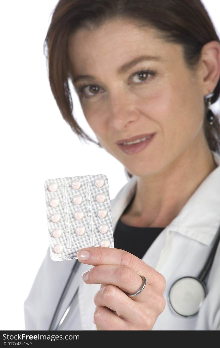 Female doctor handing over medicine isolated on white