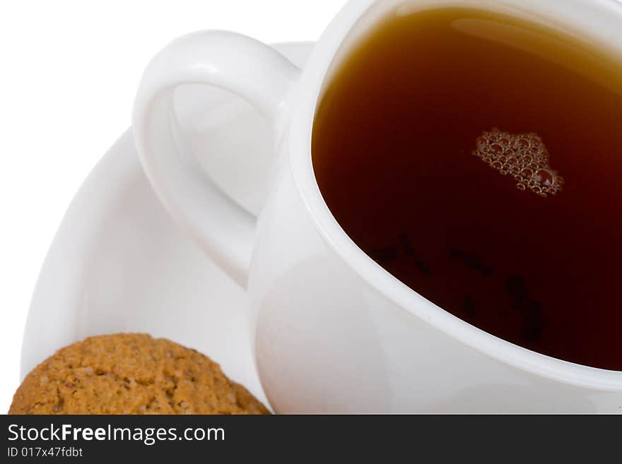 Close-up Cup Of Tea And Cookie