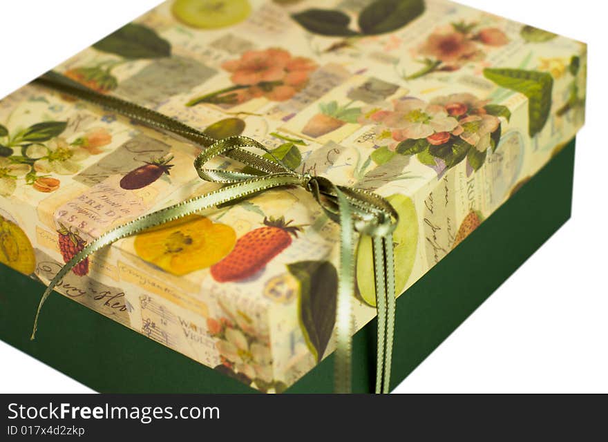 Closeup of green gift box with bow