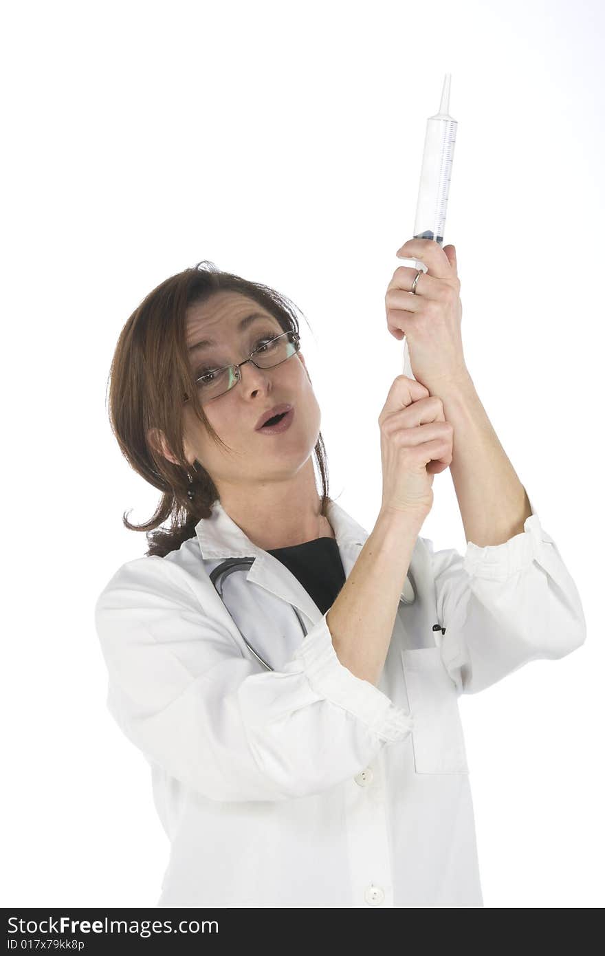 Doctor holding a big syringe and getting ready for injection