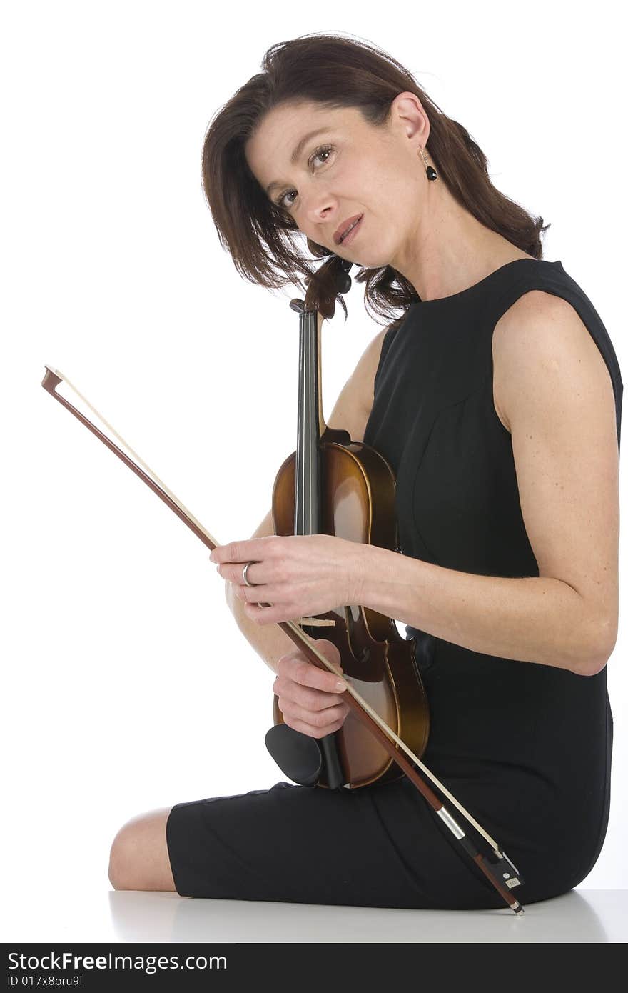 Violin player posing isolated over white background