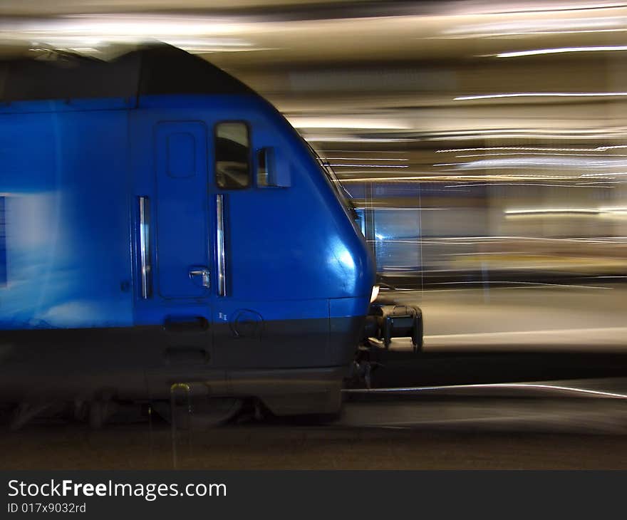 Blue underground train running