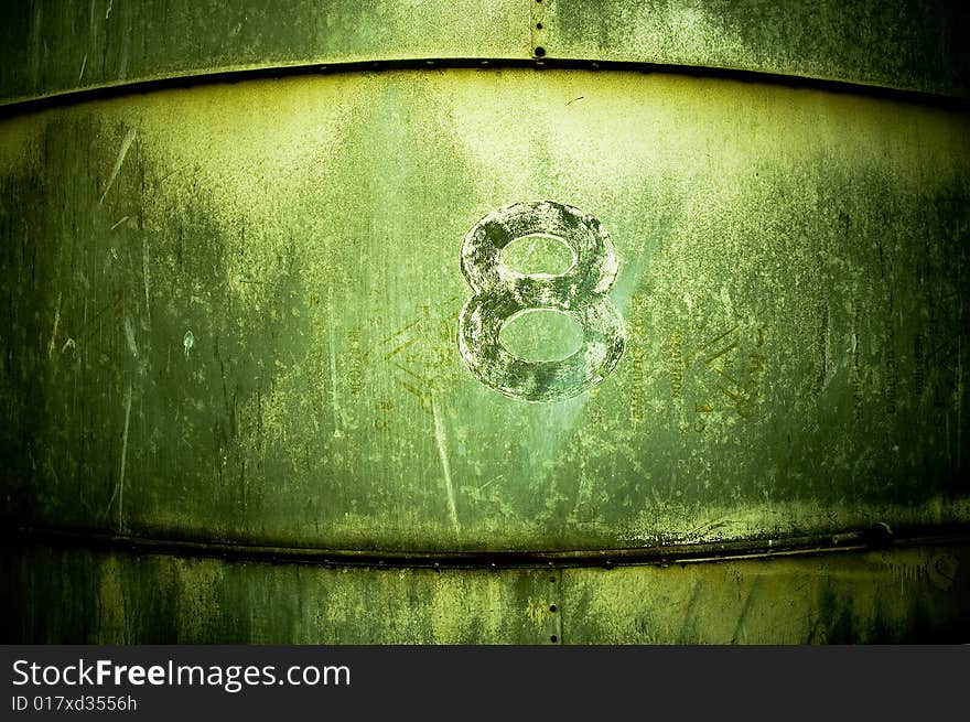 The number eight photographed on the side of an abandoned grain silo. The number eight photographed on the side of an abandoned grain silo