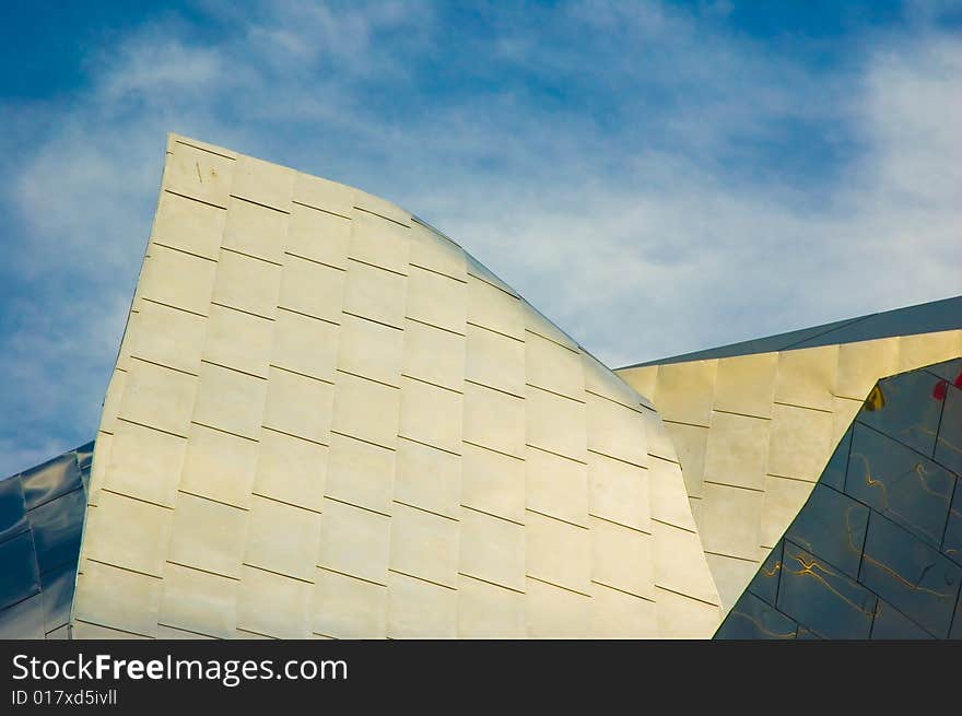 Abstract photos of building wings with blue sky and clouds. Abstract photos of building wings with blue sky and clouds