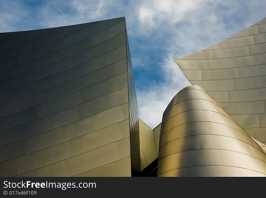 Abstract photos of building wings with blue sky and clouds. Abstract photos of building wings with blue sky and clouds