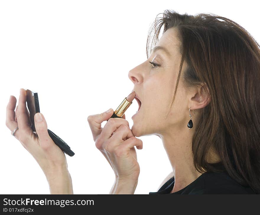 Woman applying make up