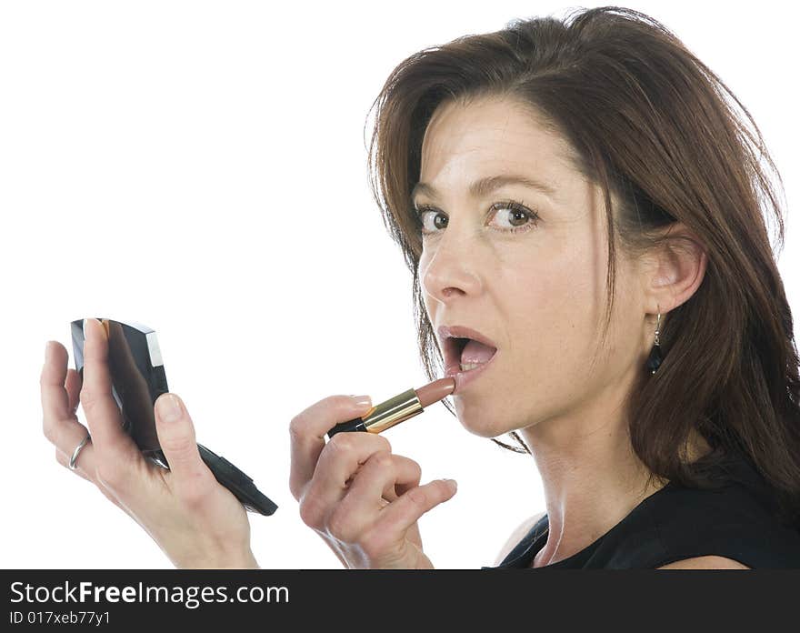 Woman applying make up