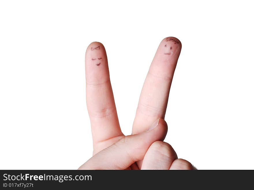 Two human fingers with drawing face on them