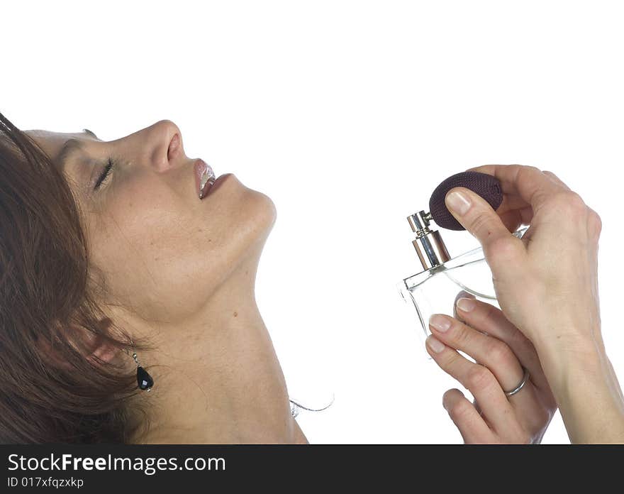 Sensual Woman Applying Perfume On Her Body