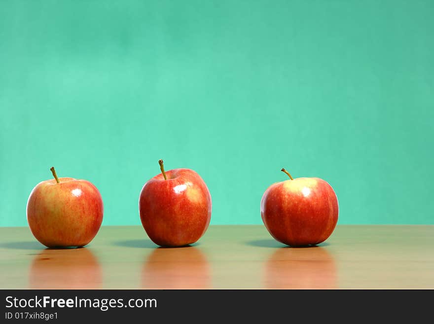 An apple on a desk in the classroom