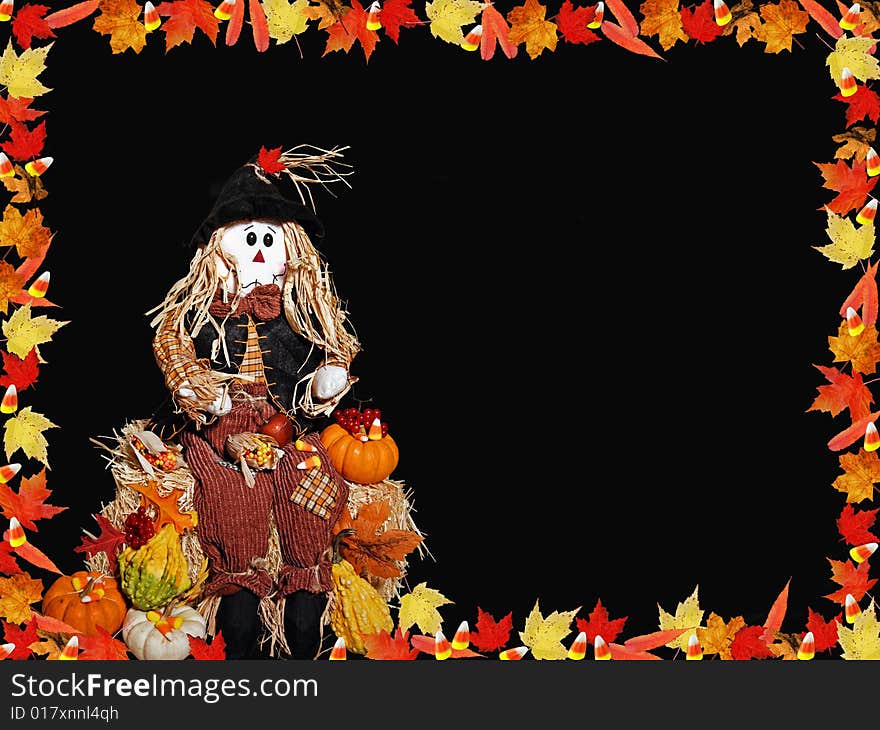 Leaf and candy border with a scarecrow on hay bale. Leaf and candy border with a scarecrow on hay bale.