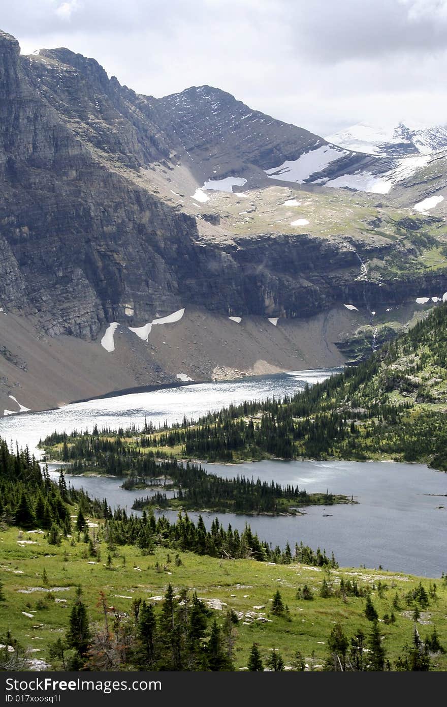 A lake cleverly hidden between mountain ridges. A lake cleverly hidden between mountain ridges