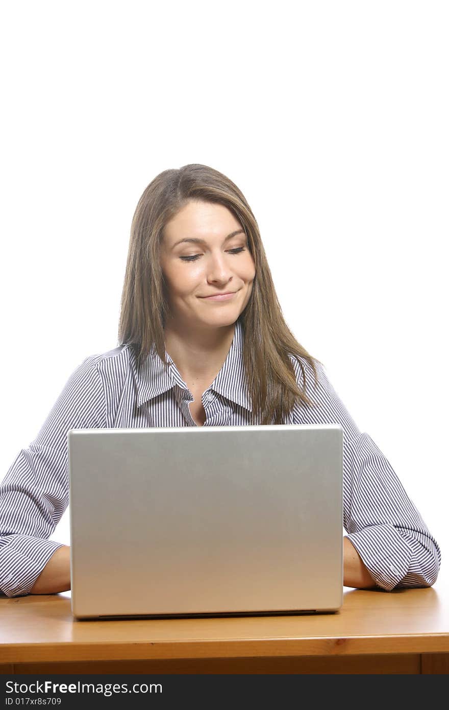 A business woman on her laptop at a desk