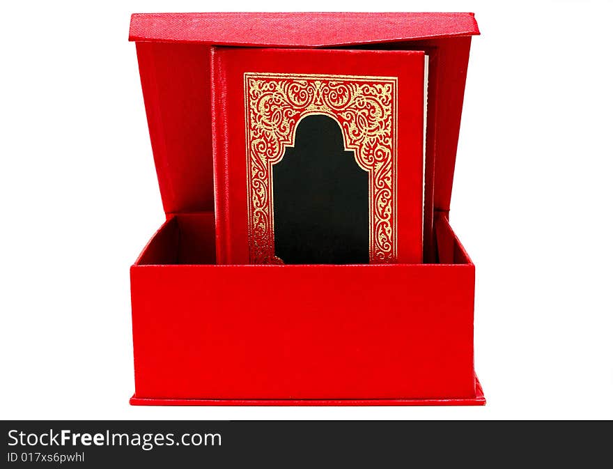 Red Cover Book With Golden Ornament In Red Box.