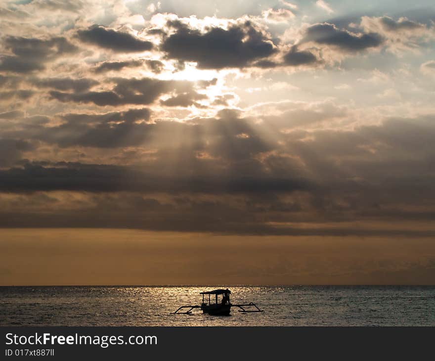 Photo of boat in the sunset