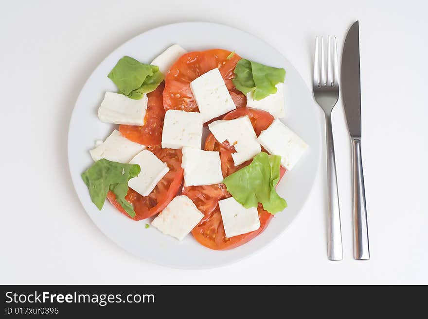 A fresh salad isolated over white background