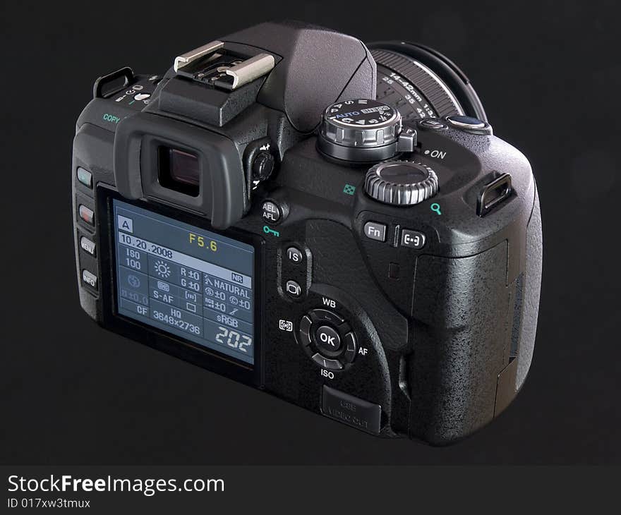 Black DSLR back view with LCD screen