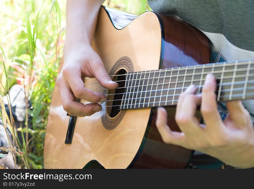 Acoustic Guitar In Hands