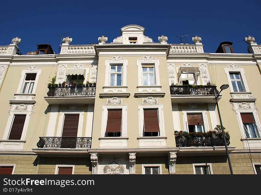 Classic building architecture details over blue sky. Classic building architecture details over blue sky