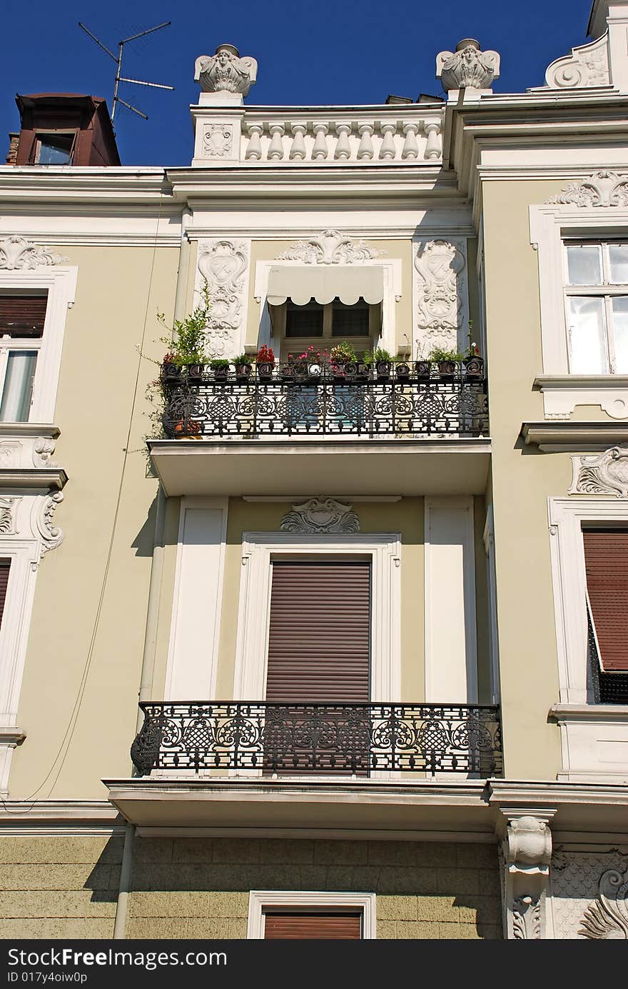 Classic building architecture details over blue sky. Classic building architecture details over blue sky