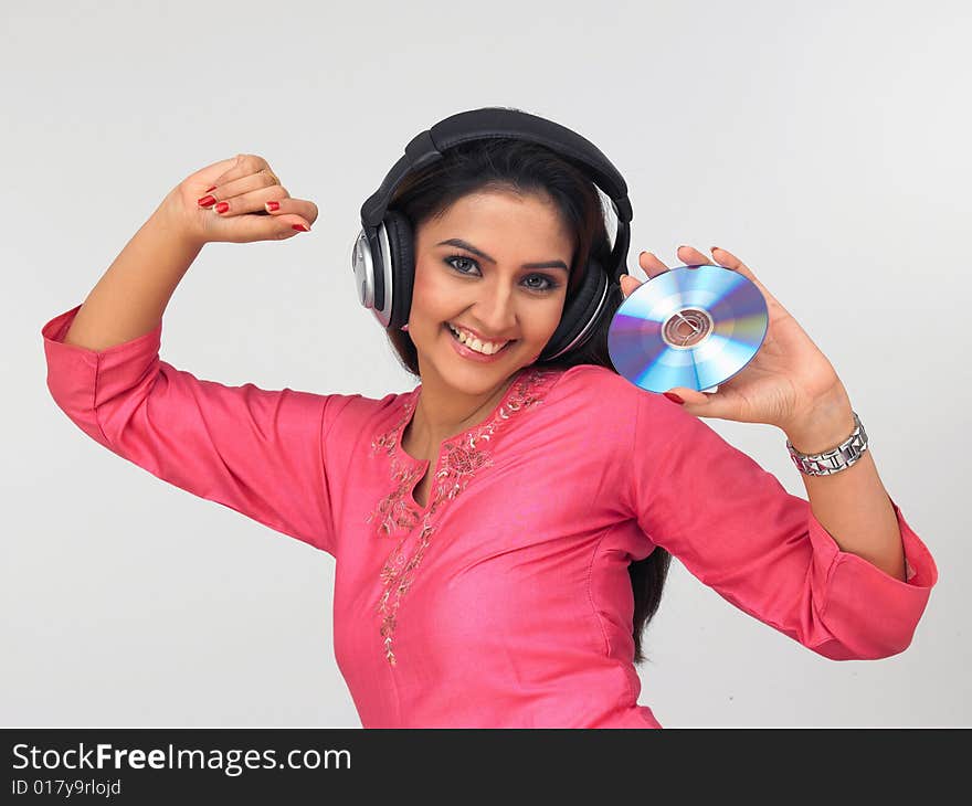 Asian woman enjoying music