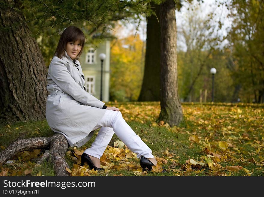 Young woman in autumn park