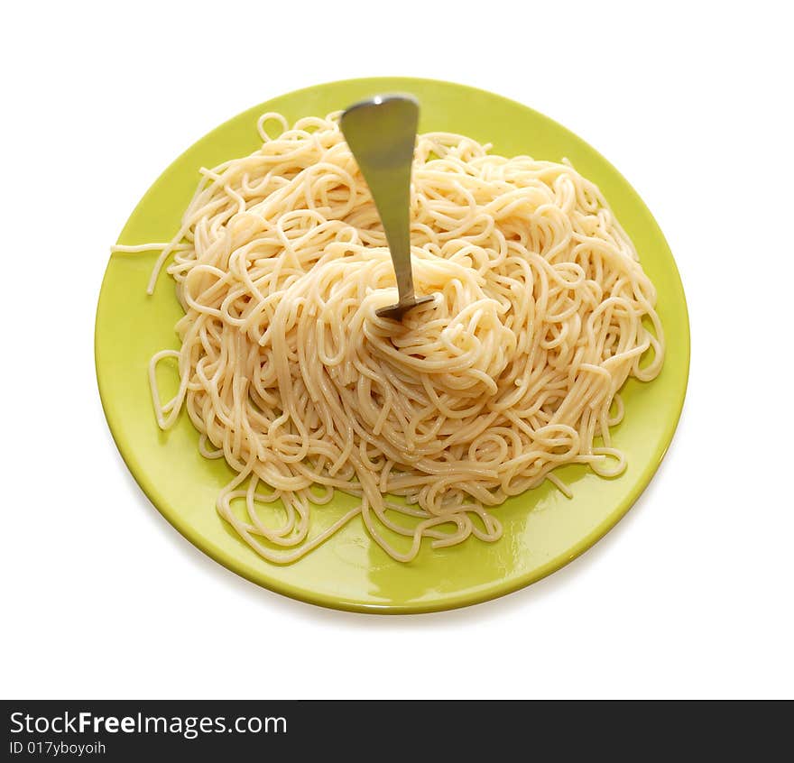 Spaghetti Around Fork On Green Plate