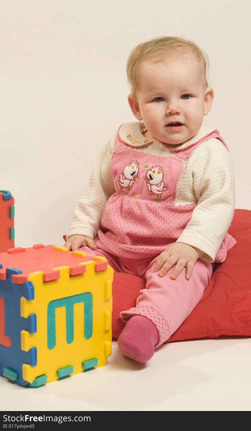 Baby in pink clothes