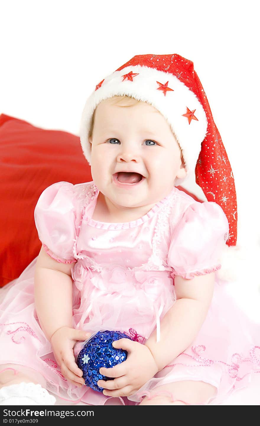 Baby in red hat on white ground. Baby in red hat on white ground