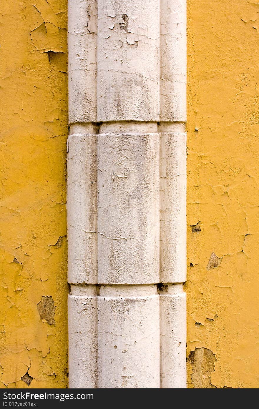 Old dirty column on the wall. Old dirty column on the wall.