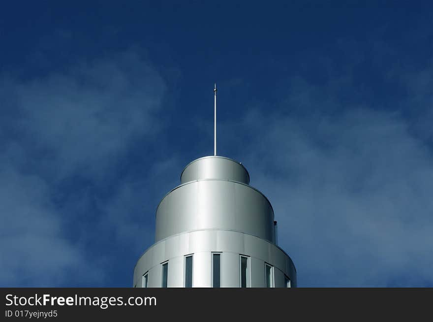 Modern dome and flagstaff. Patch of sunlight. Modern dome and flagstaff. Patch of sunlight.