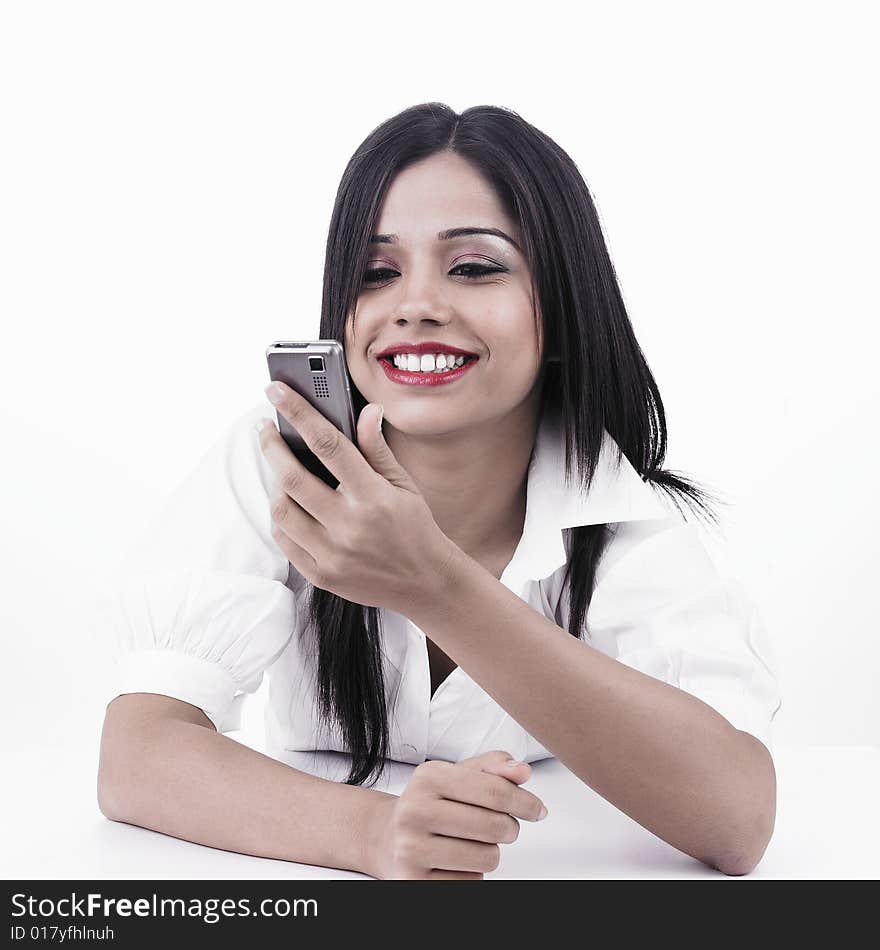 A pretty asian girl looking at her cell phone