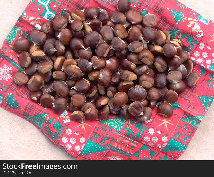 Chestnuts on Christmas theme background