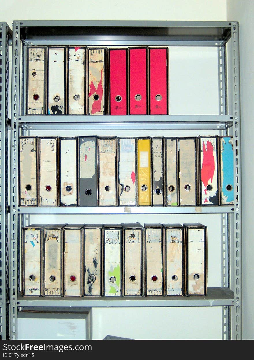 Coloured file folders in office cabinet