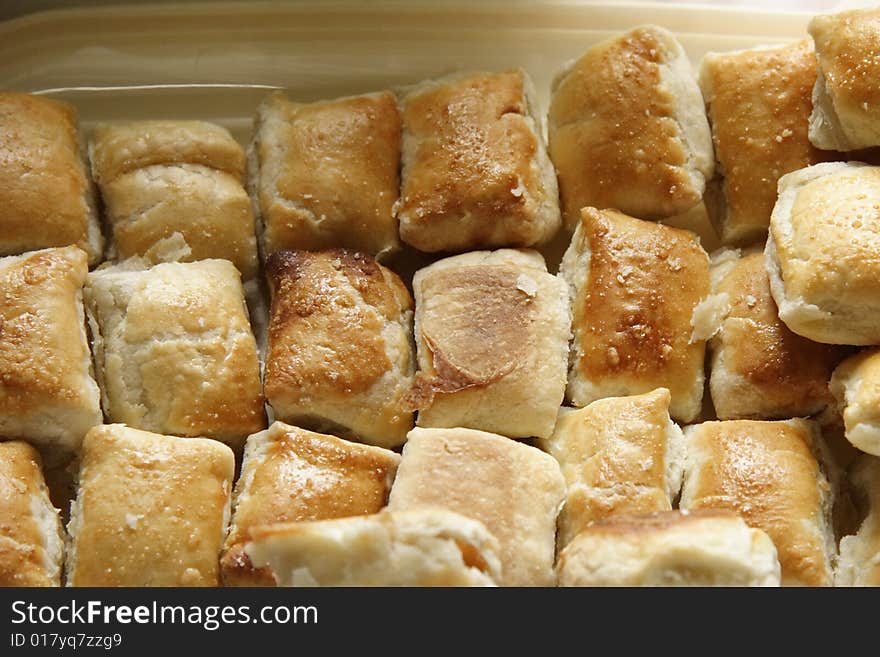 Freshly backed sausage rolls for a buffet