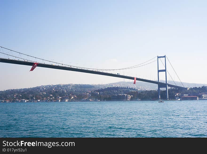 The Bosphorus Bridge, also called the First Bosphorus Bridge is one of the two bridges in Istanbul, Turkey spanning the Bosphorus strait. The Bosphorus Bridge, also called the First Bosphorus Bridge is one of the two bridges in Istanbul, Turkey spanning the Bosphorus strait.