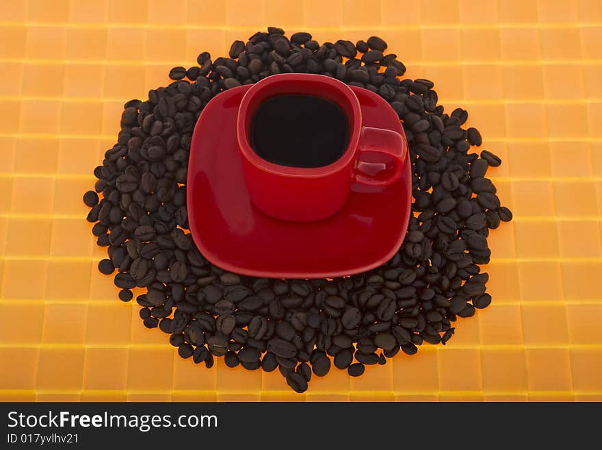 Red cup with coffee beans