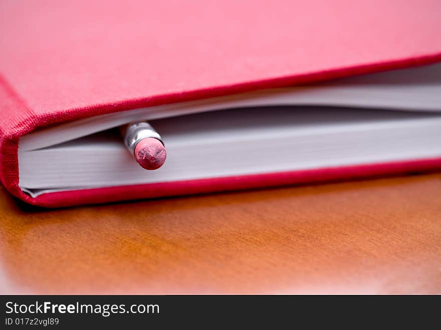 Book with pencil inside