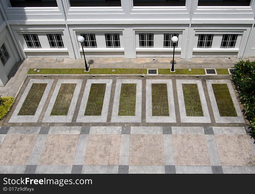 Empty car parking lots in colonial style building. Empty car parking lots in colonial style building