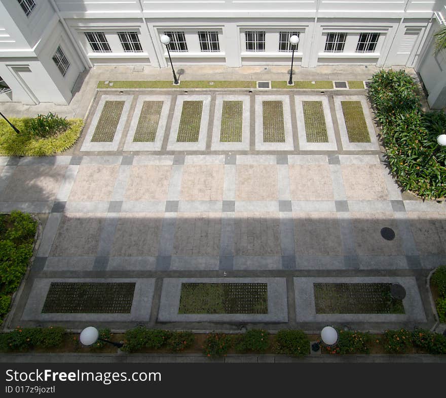 Empty car parking lots in colonial style building. Empty car parking lots in colonial style building