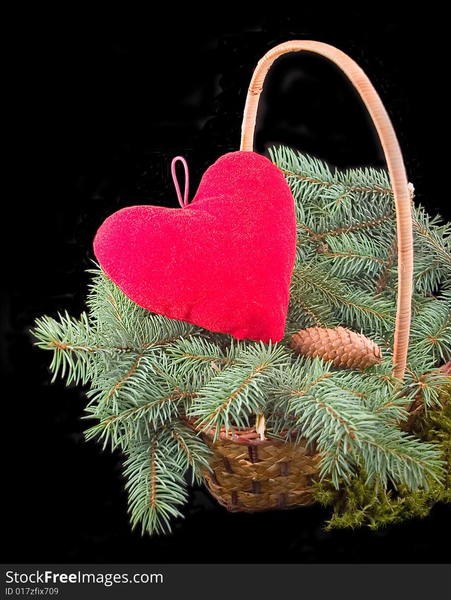 Red heart in basket with tree