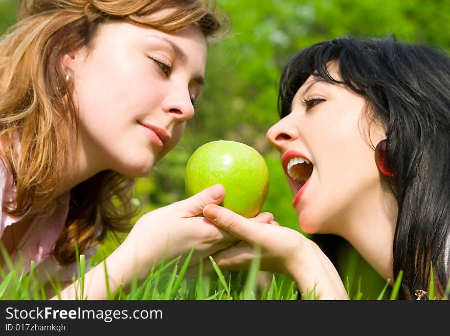 Pretty Women Eating Green Apple