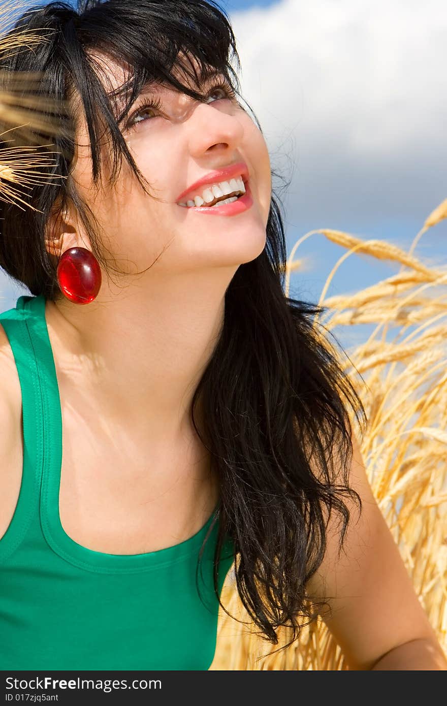 Woman in golden wheat